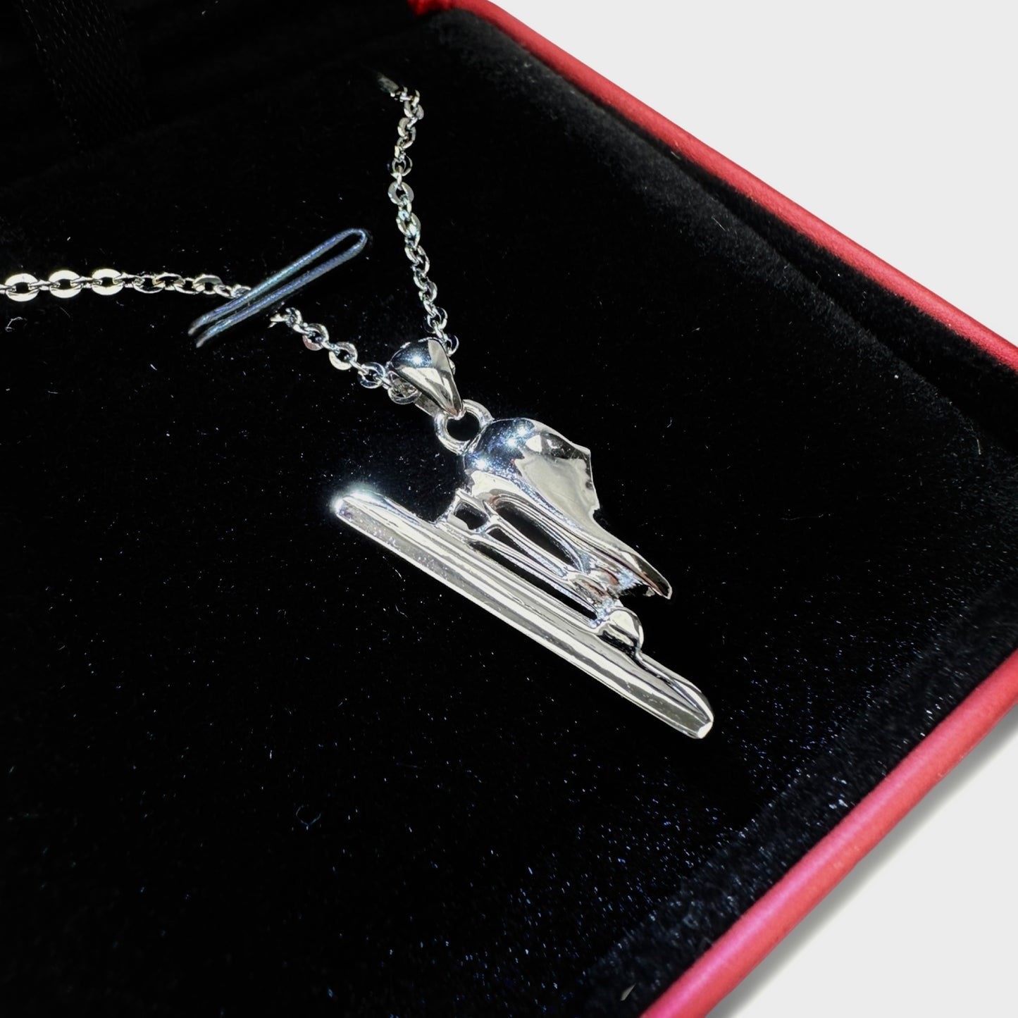 Chaîne et pendentif longue piste SKATE-TEC